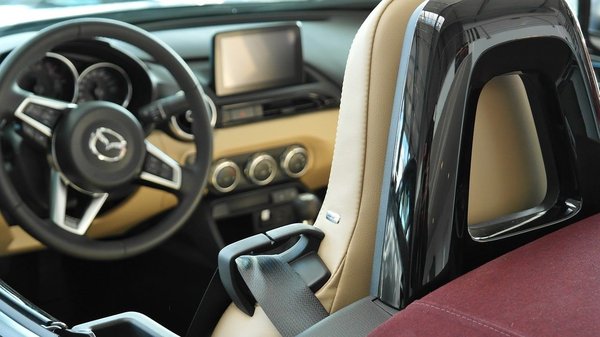 How to Properly Adjust the Ride Height on an Adjustable Coilover Kit in a Mazda RX-7?